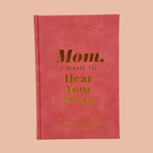 Red notebook with gold text on a beige background